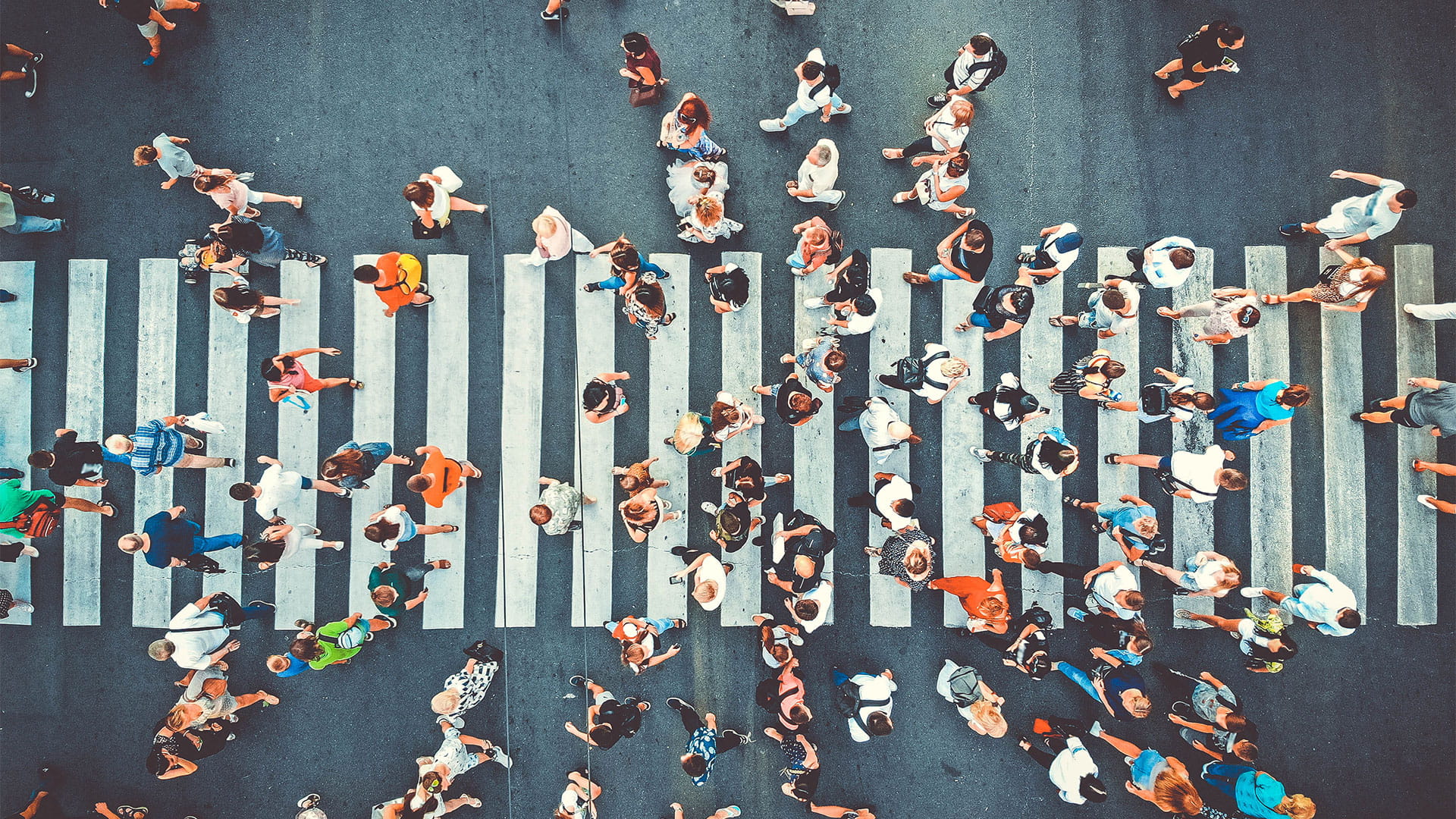 People crossing the street above view