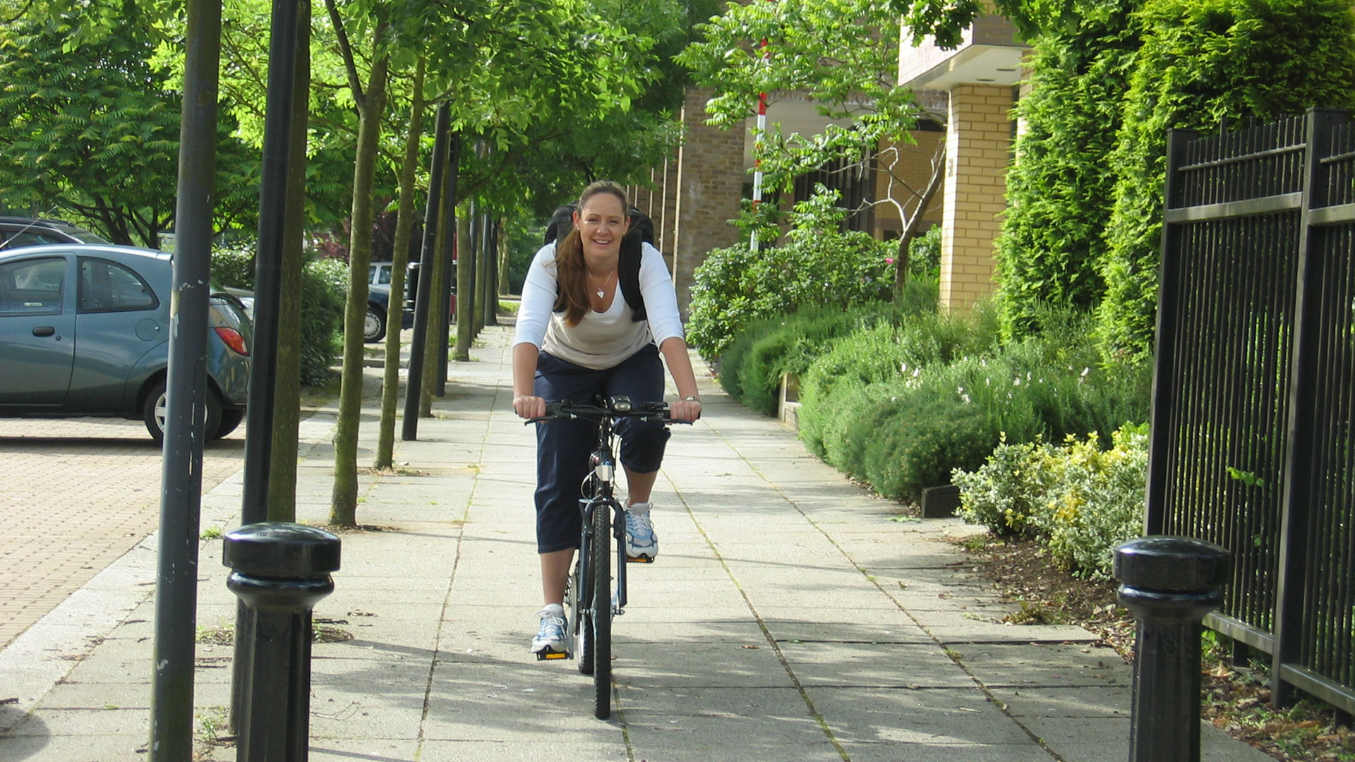 Women cycling on pavement