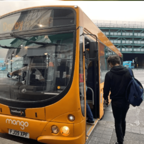 Person boarding a bus
