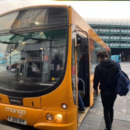 Person boarding a bus