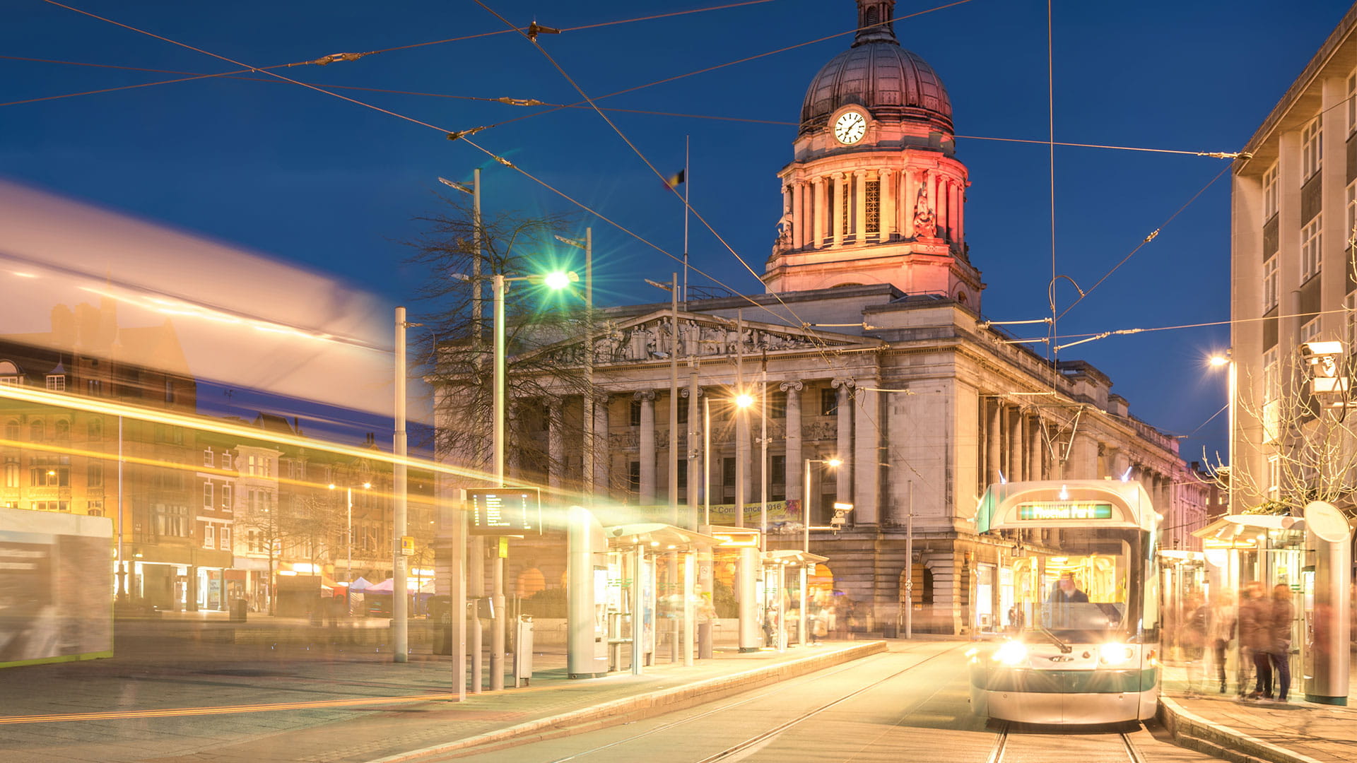 Square in city by evening
