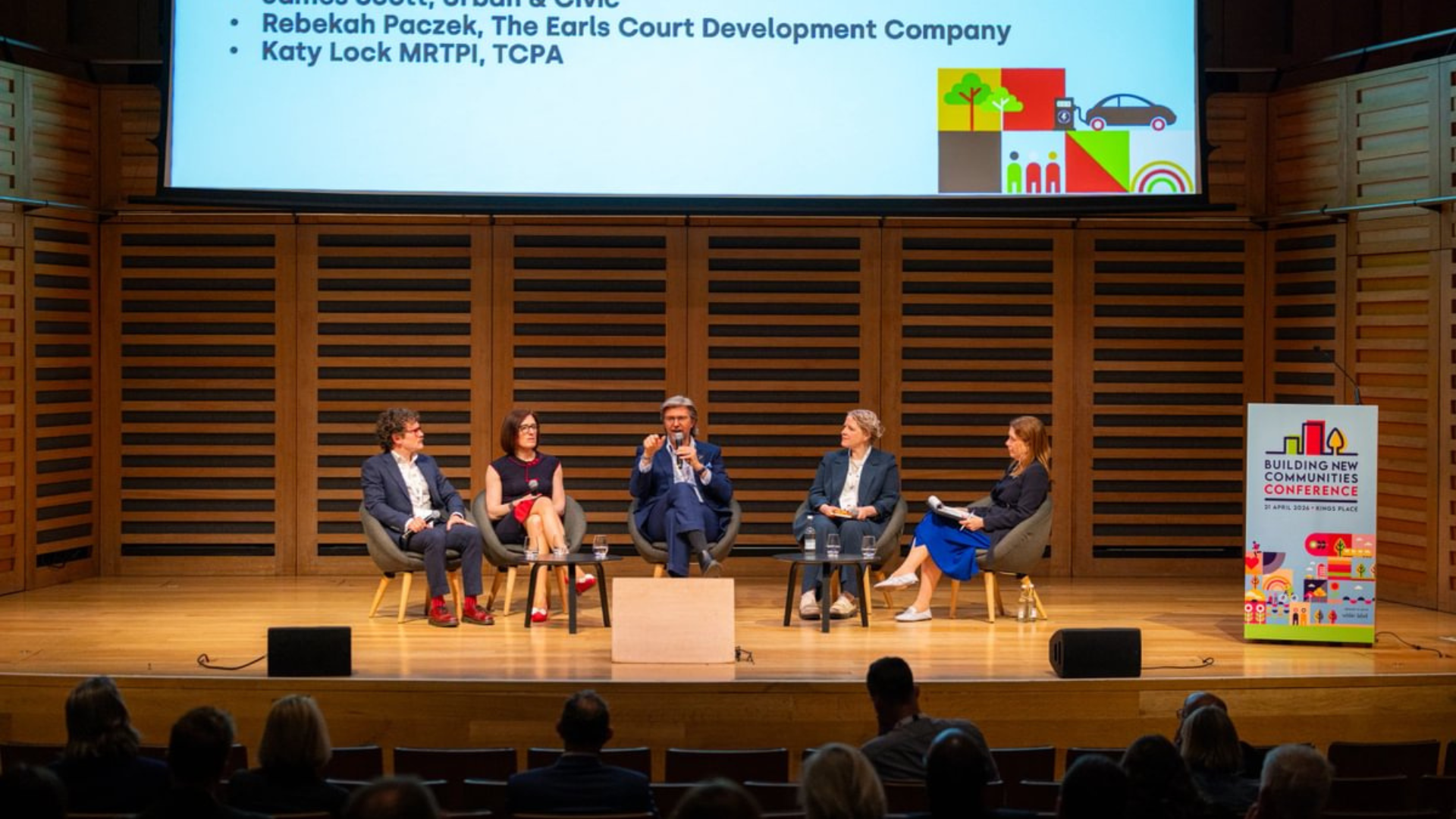 Building New Communities conference stage