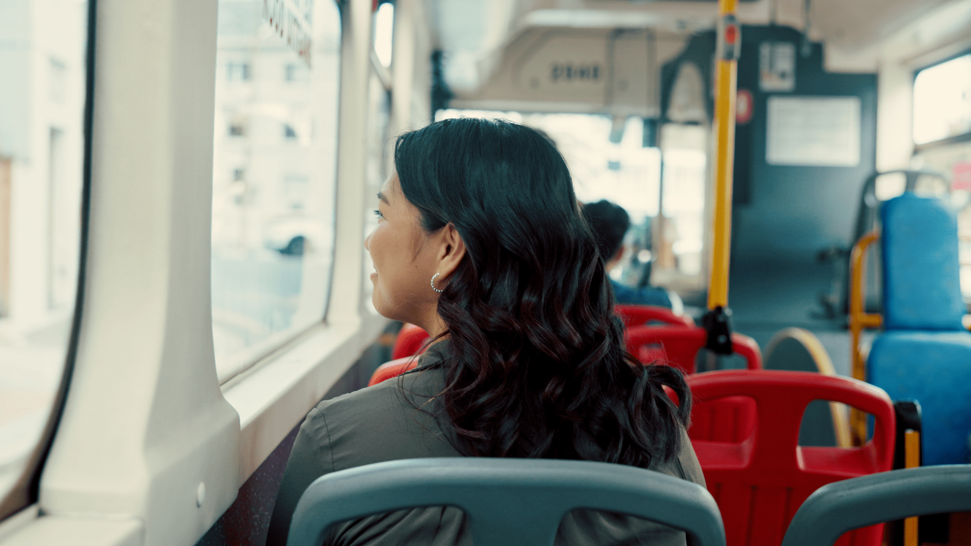 Woman on a bus