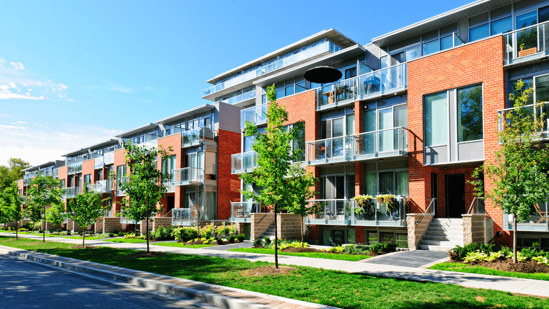Apartment buildings with green trees infront