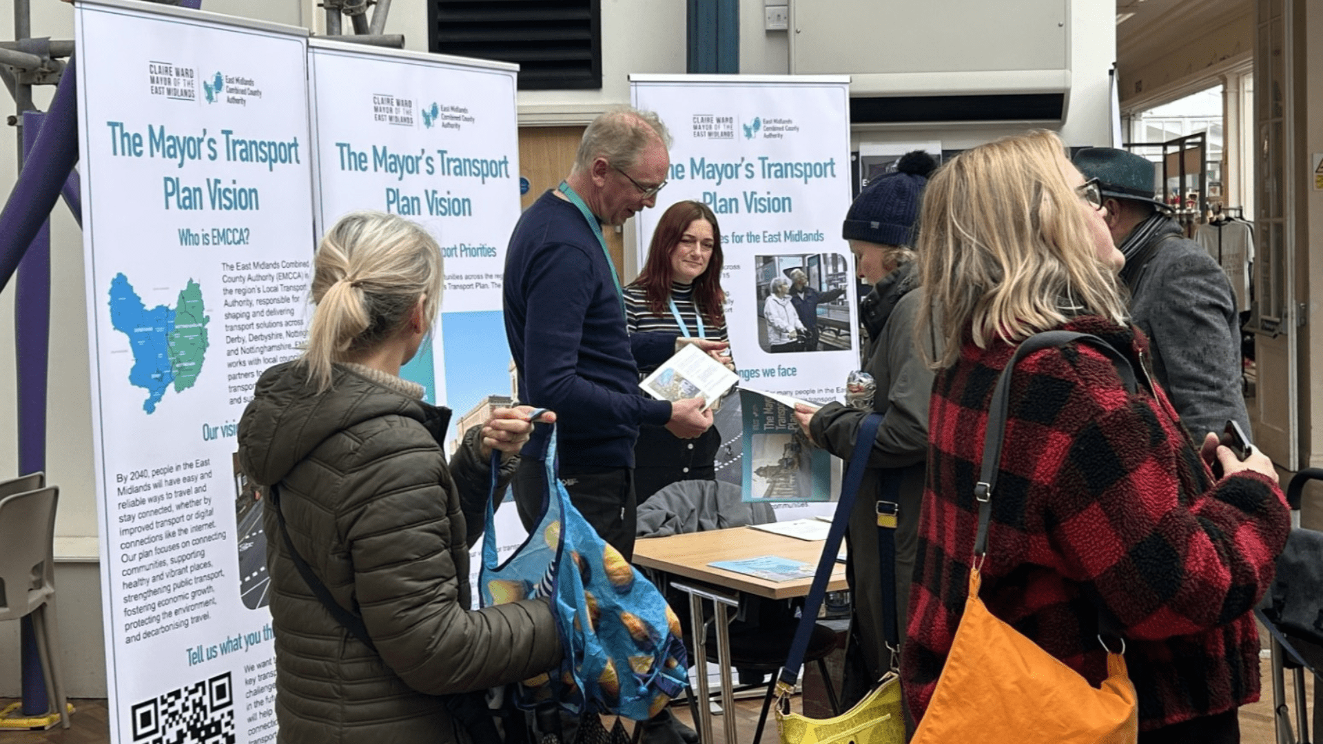 Attendees visiting the consultation stand at the event.