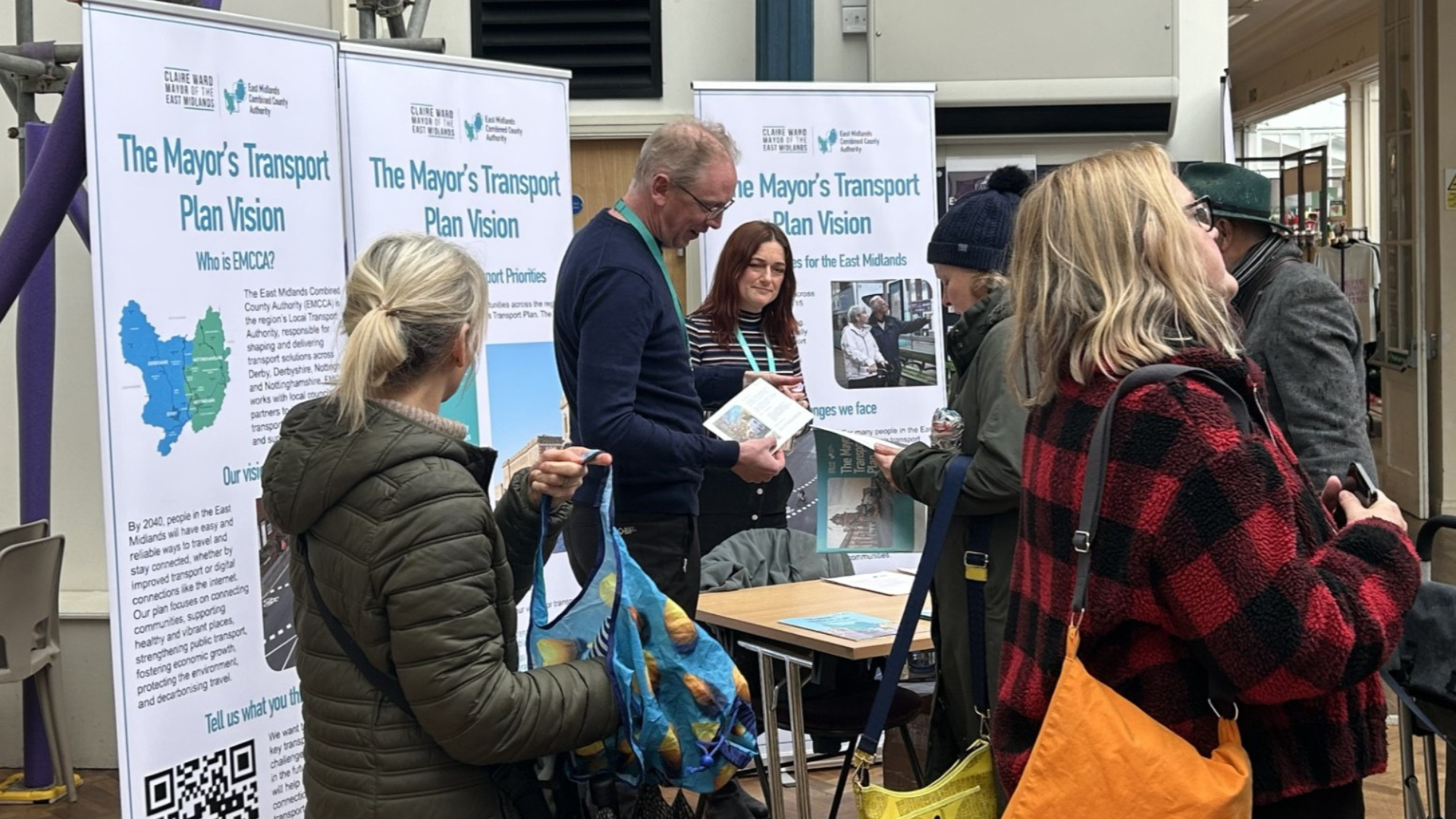 Attendees visiting the consultation stand at the event.